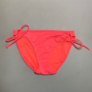 Victoria’s Secret tie side bikini bottoms.  Neon orange/salmon. Size small